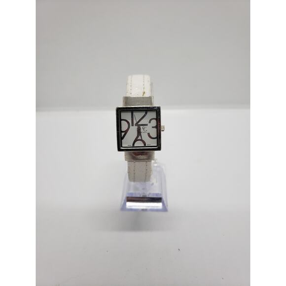 CC women\'s watch. Large white square face.